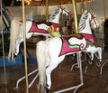Two White Paker Jumping Horses